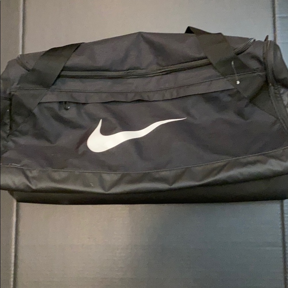 Black Nike duffel bag